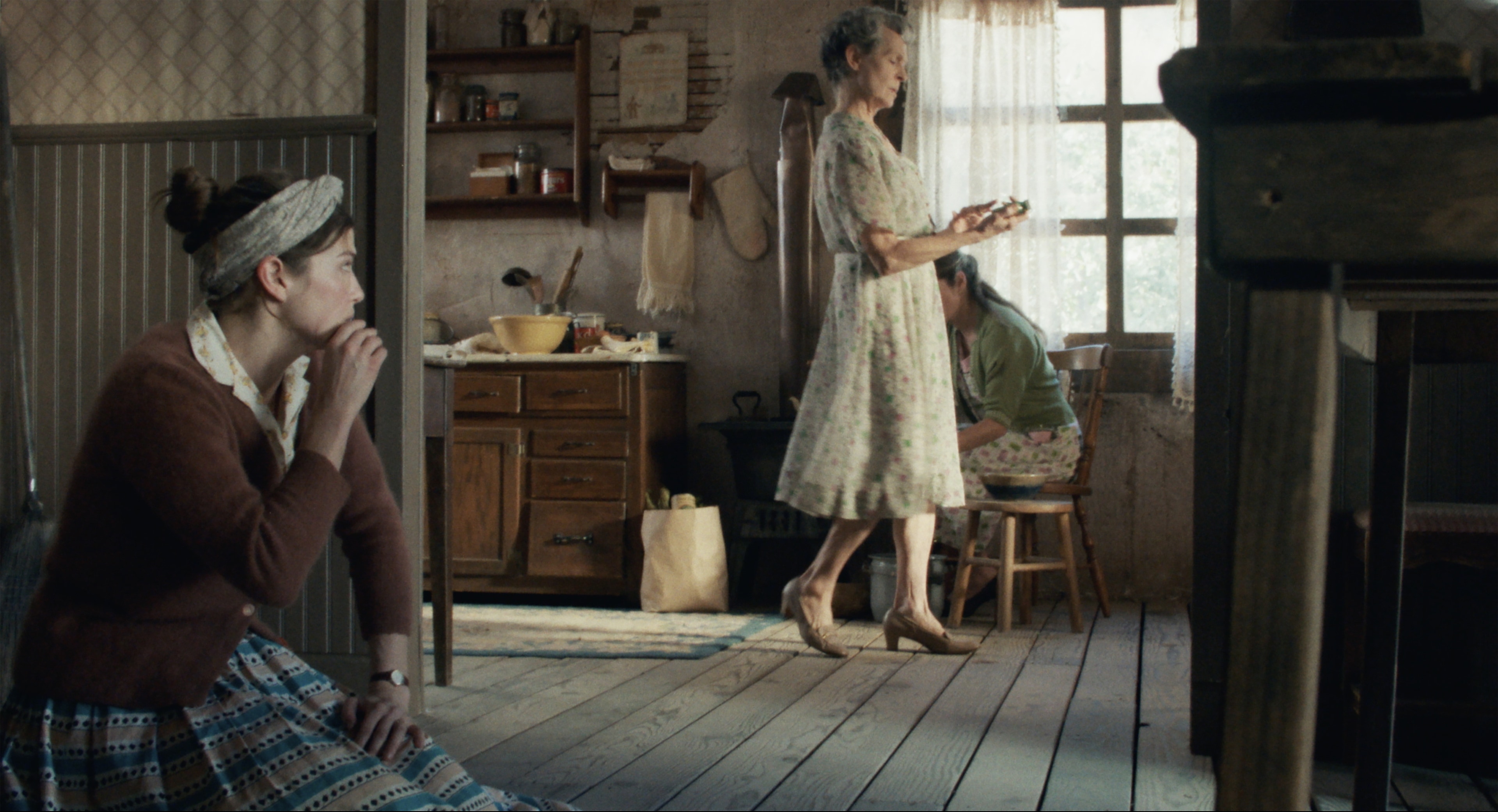 Two women in a 1960s Appalachian farmhouse kitchen — still from North